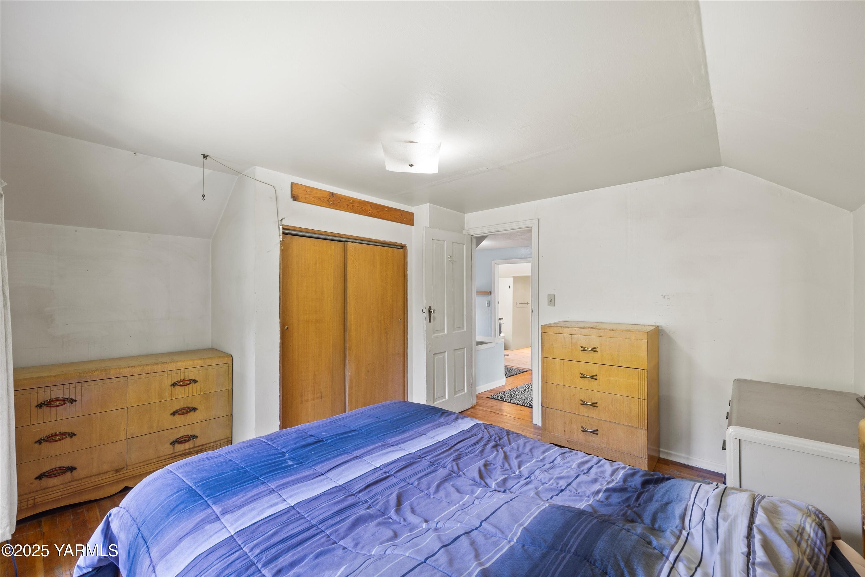 305 South 9th Street Yakima, WA 98901 - Photo 16 of 43 a bedroom with a bed and a dresser
