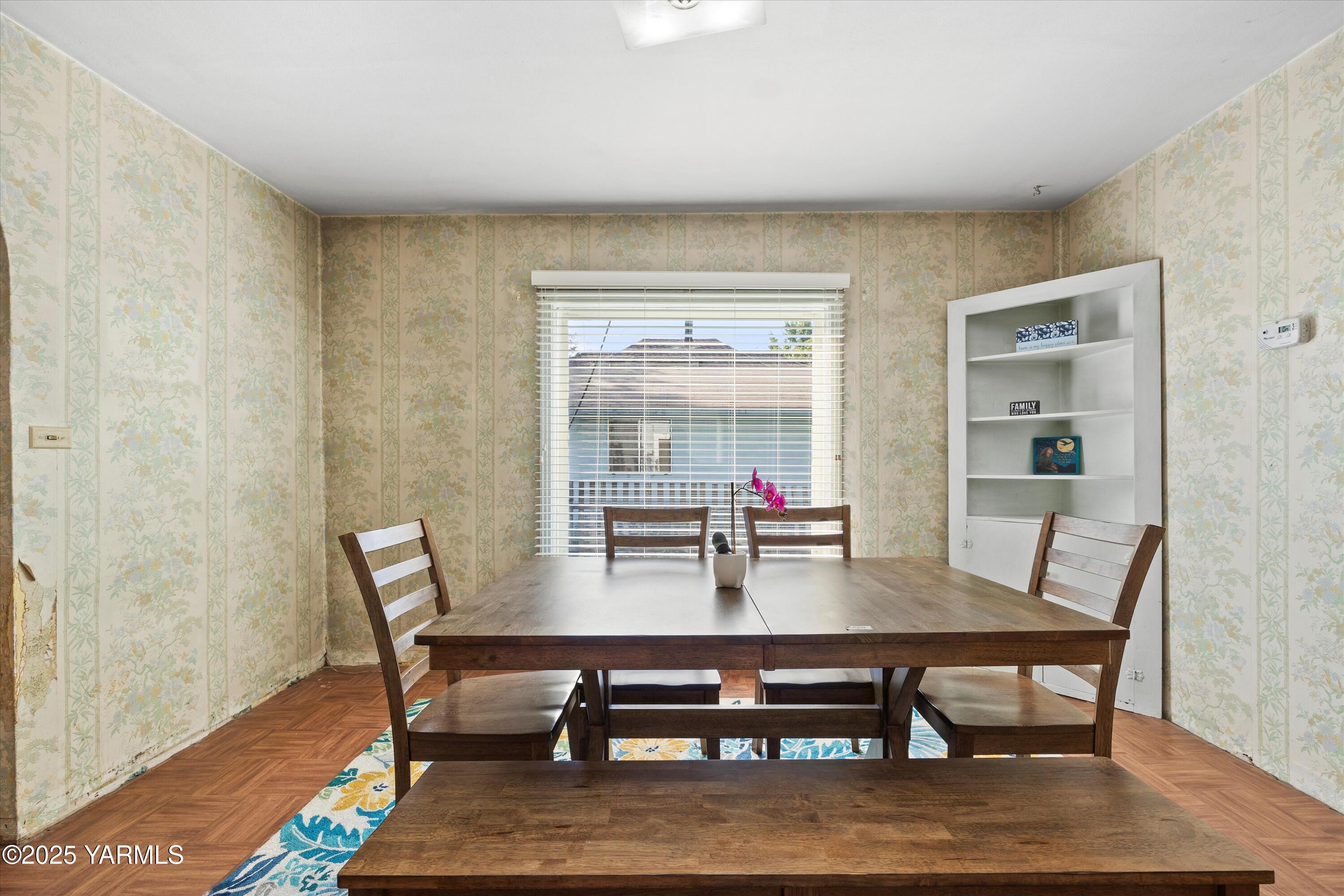 305 South 9th Street Yakima, WA 98901 - Photo 20 of 43 a dining room with furniture and wooden floor