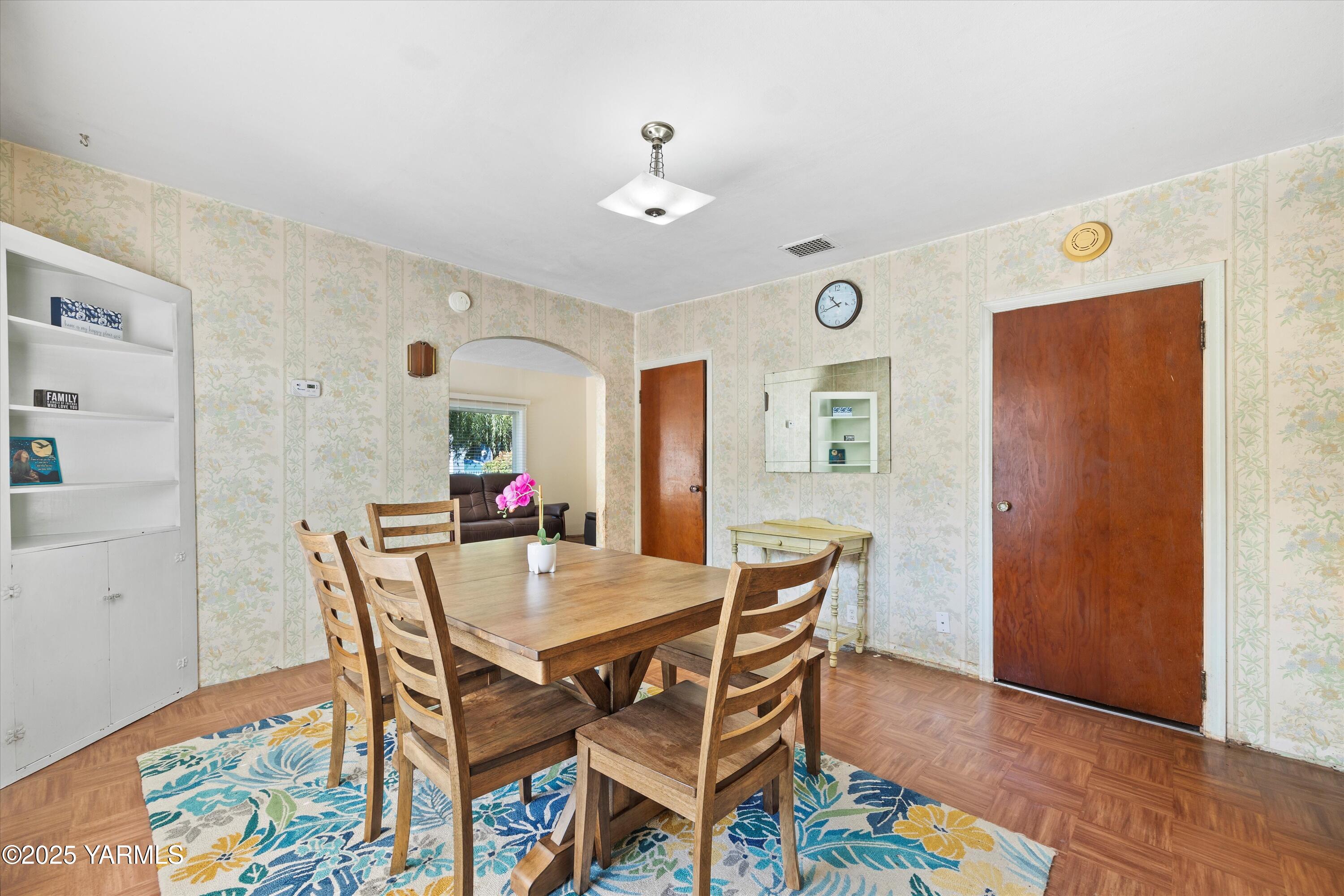 305 South 9th Street Yakima, WA 98901 - Photo 21 of 43 a view of a dining room with furniture and wooden floor