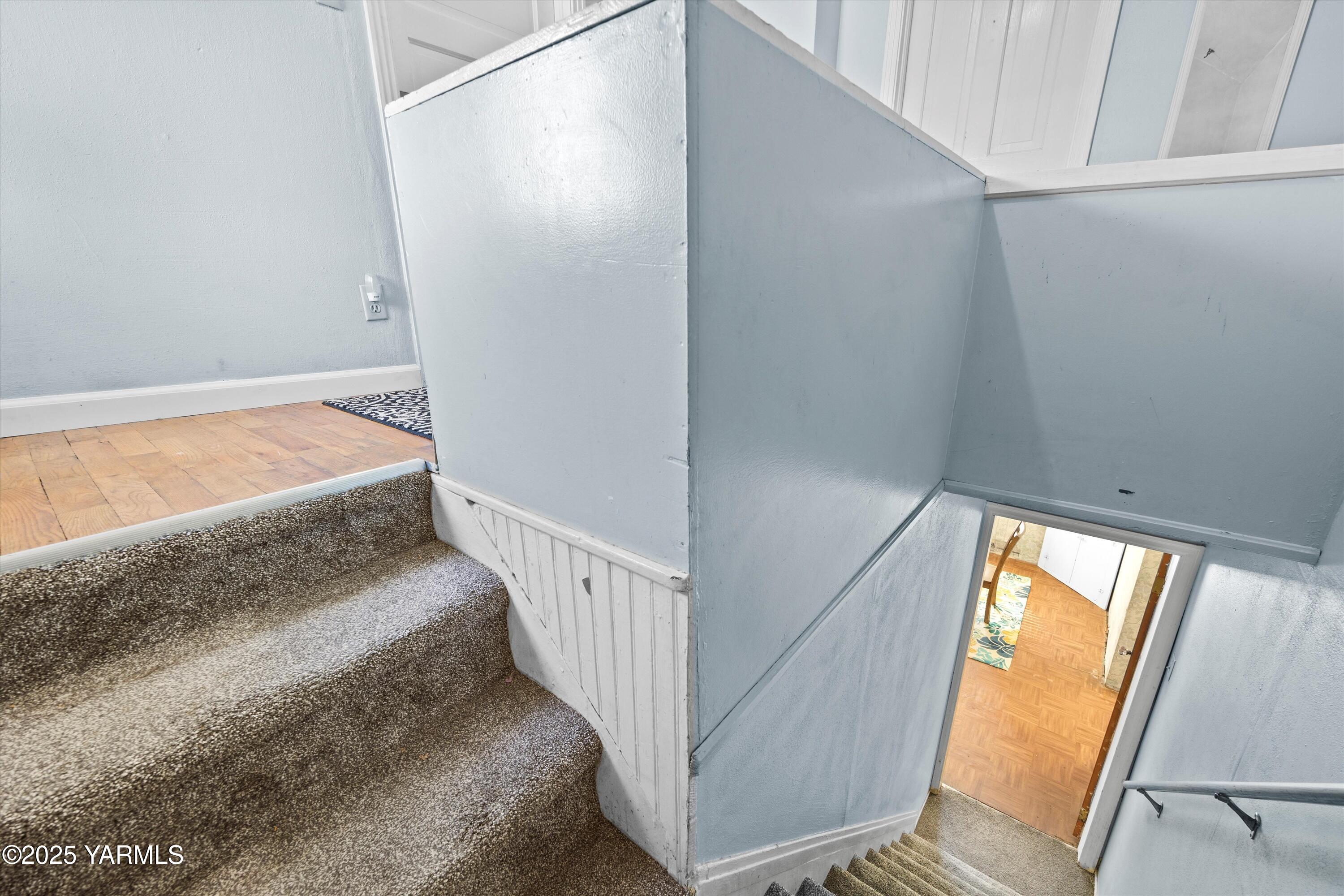 305 South 9th Street Yakima, WA 98901 - Photo 4 of 43 a bedroom with a bed and a window with wooden floor