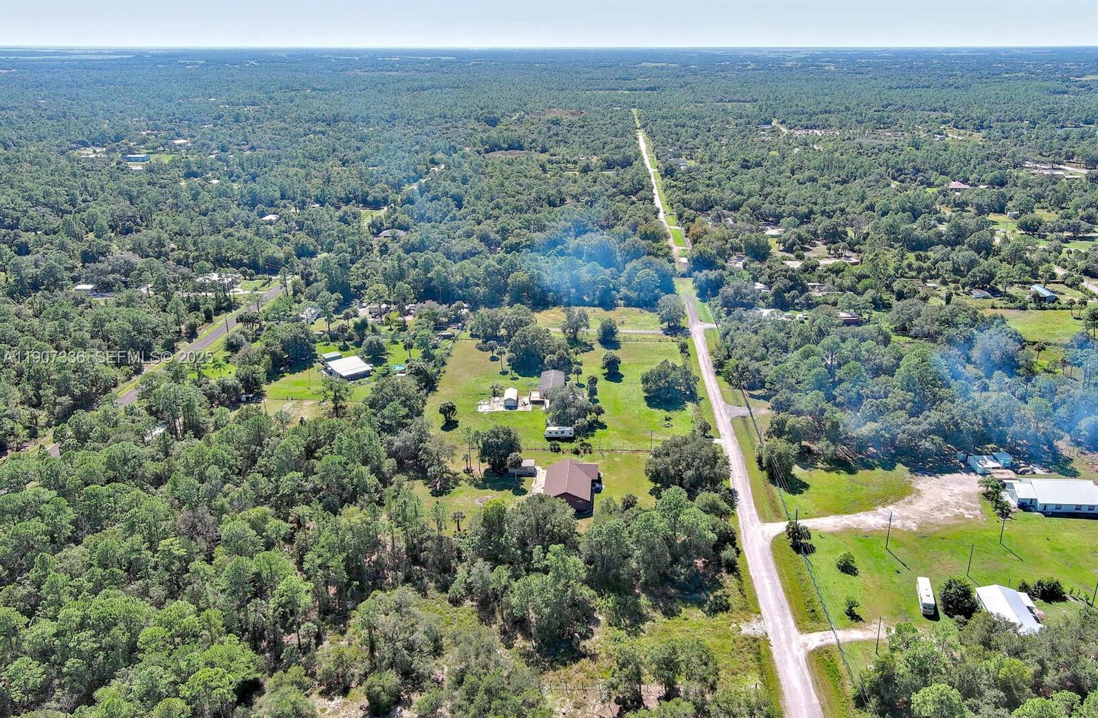 325 South Estribo Street Clewiston, FL 33440 - Photo 5 of 15 an aerial view of multiple house