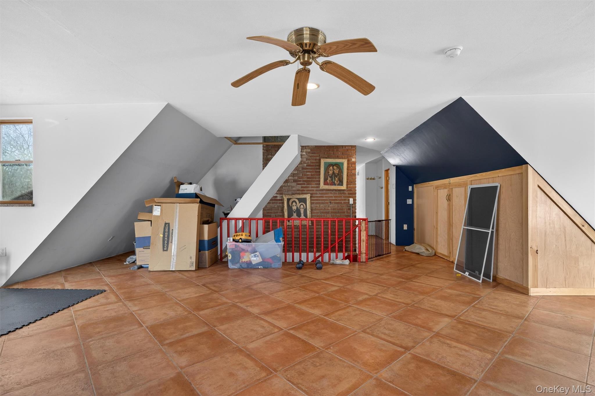 125 Dexheimer Road Narrowsburg, NY 12764 - Photo 20 of 50 Bonus room with vaulted ceiling, a ceiling fan, and tile patterned flooring