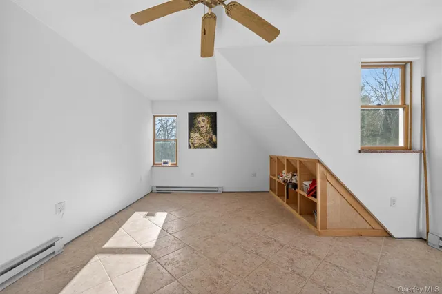 an entryway in a hall with a window