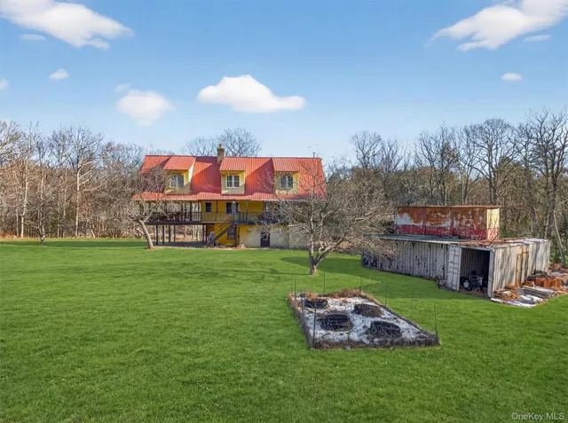 a sign that is sitting in the grass