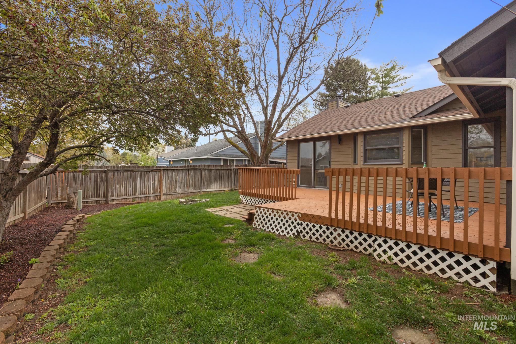 4745 North Oxbow Place Boise, ID 83713 - Photo 37 of 38 Fenced backyard with a deck