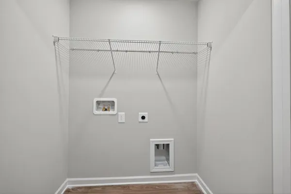 a view of a room with racks on the wall