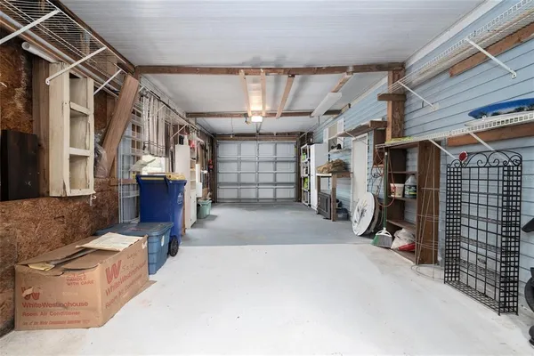 a view of livingroom with furniture and windows