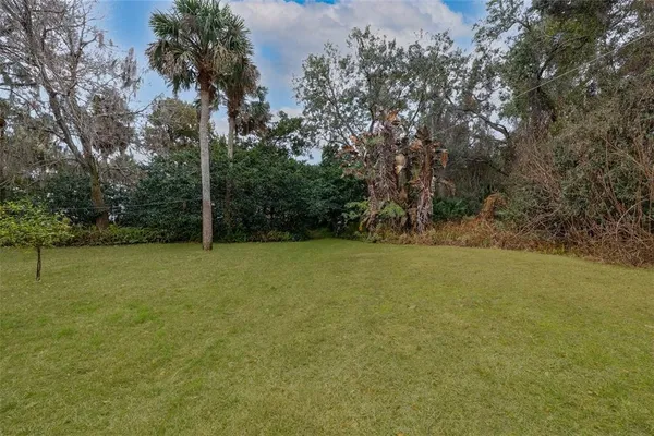 a view of outdoor space and yard