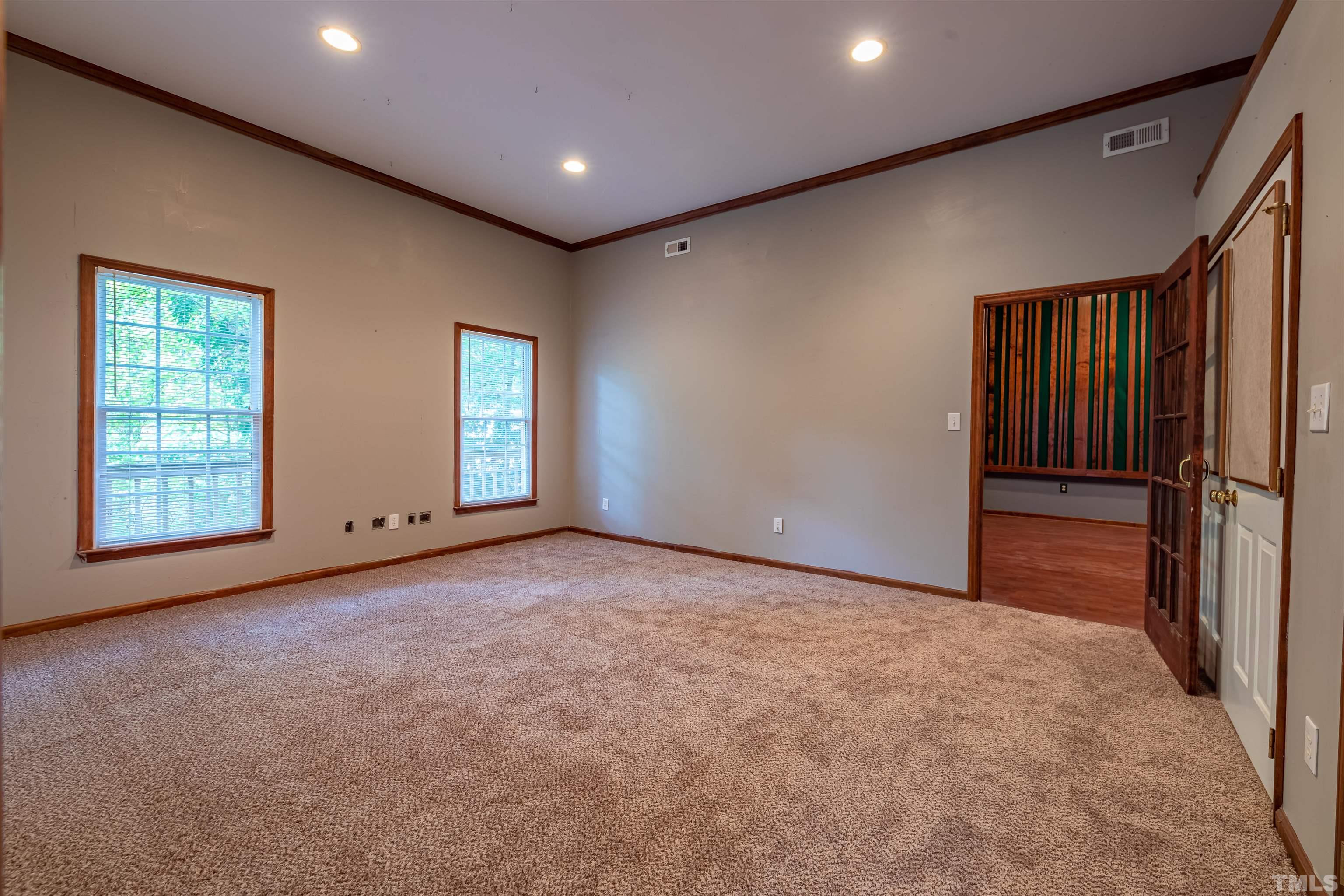 1511 Duplin Road Raleigh, NC 27607 - Photo 20 of 23 a view of an empty room with a window