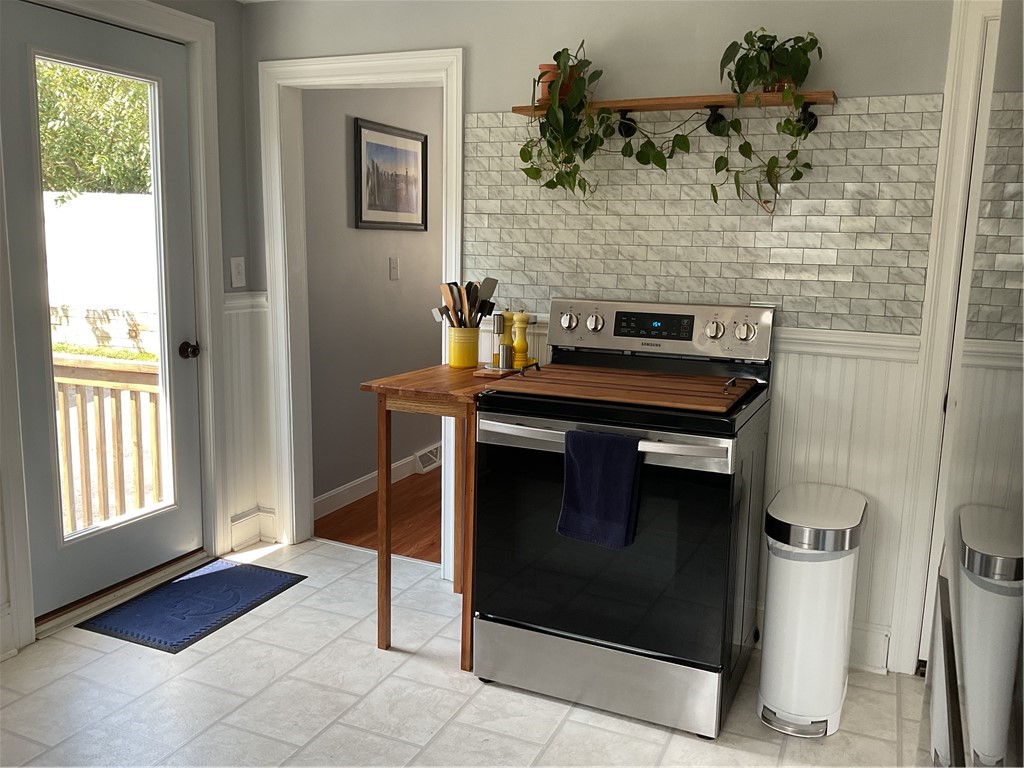 192 Knotty Oak Road Coventry, RI 02816 - Photo 9 of 26 Kitchen opens onto large backyard and deck