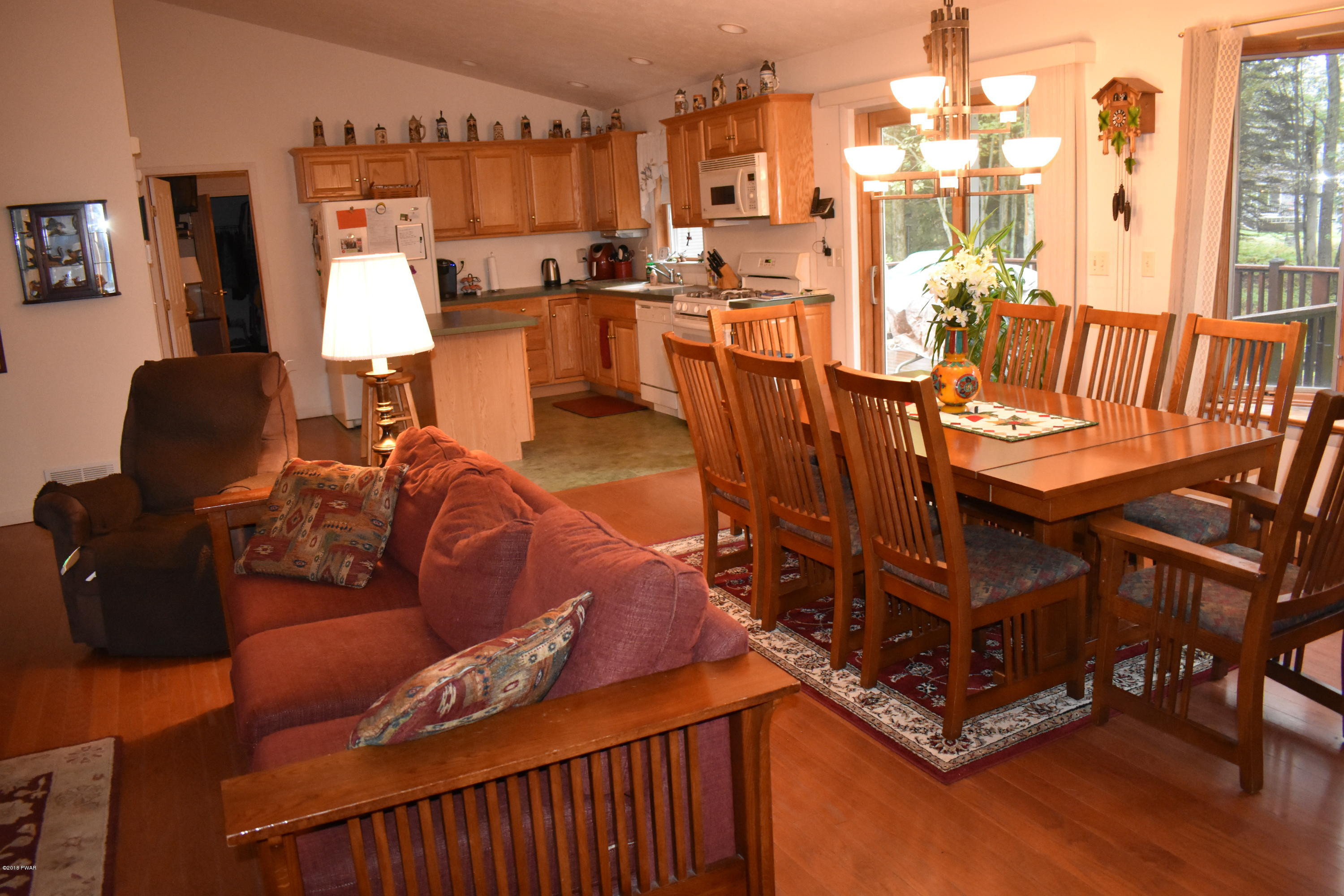 114 Rodeo Drive Hawley, PA 18428 - Photo 6 of 41 a living room with furniture and a large window