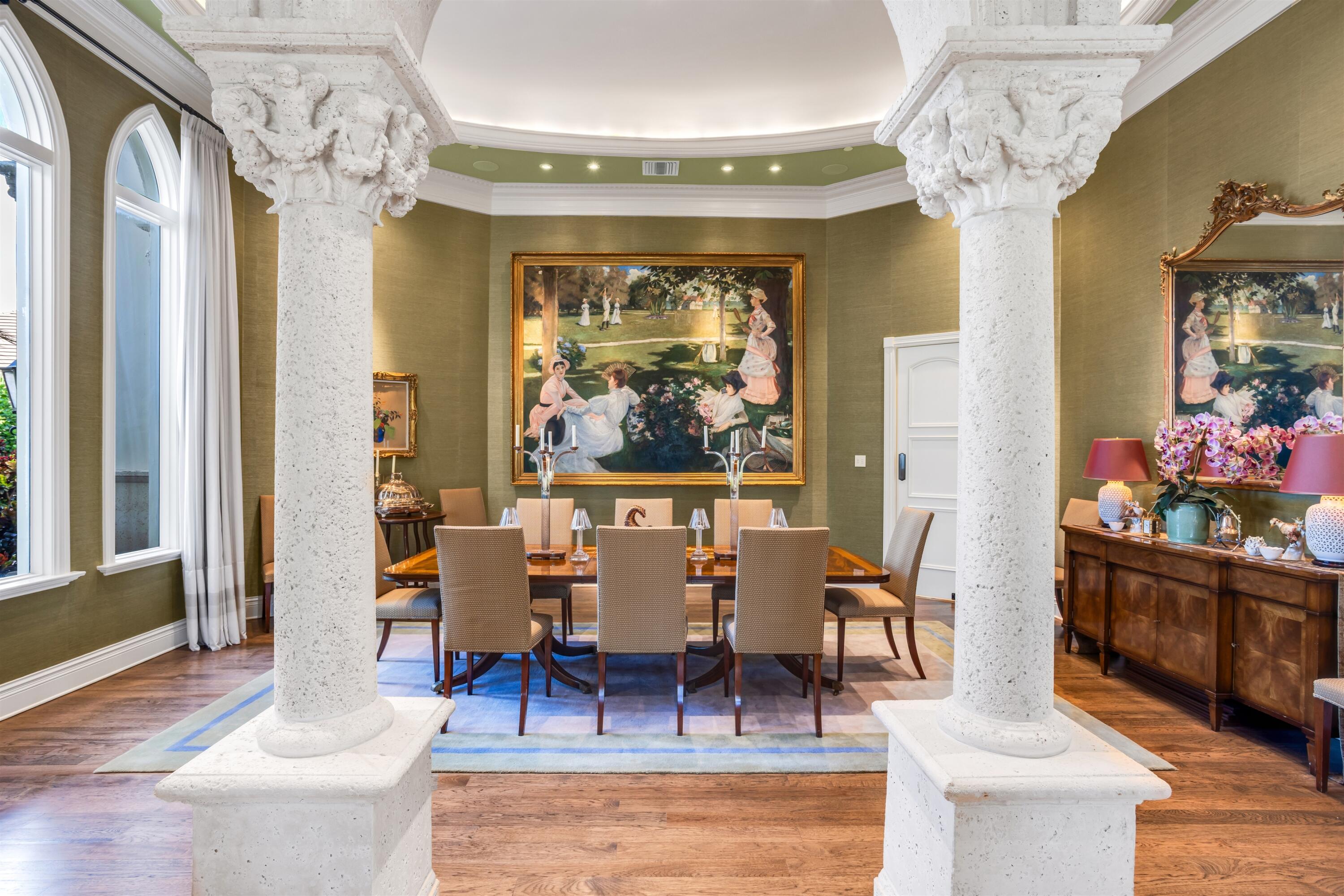 799 Northeast 45th Road Boca Raton, FL 33431 - Photo 13 of 90 a view of a dining room with furniture wooden floor and chandelier