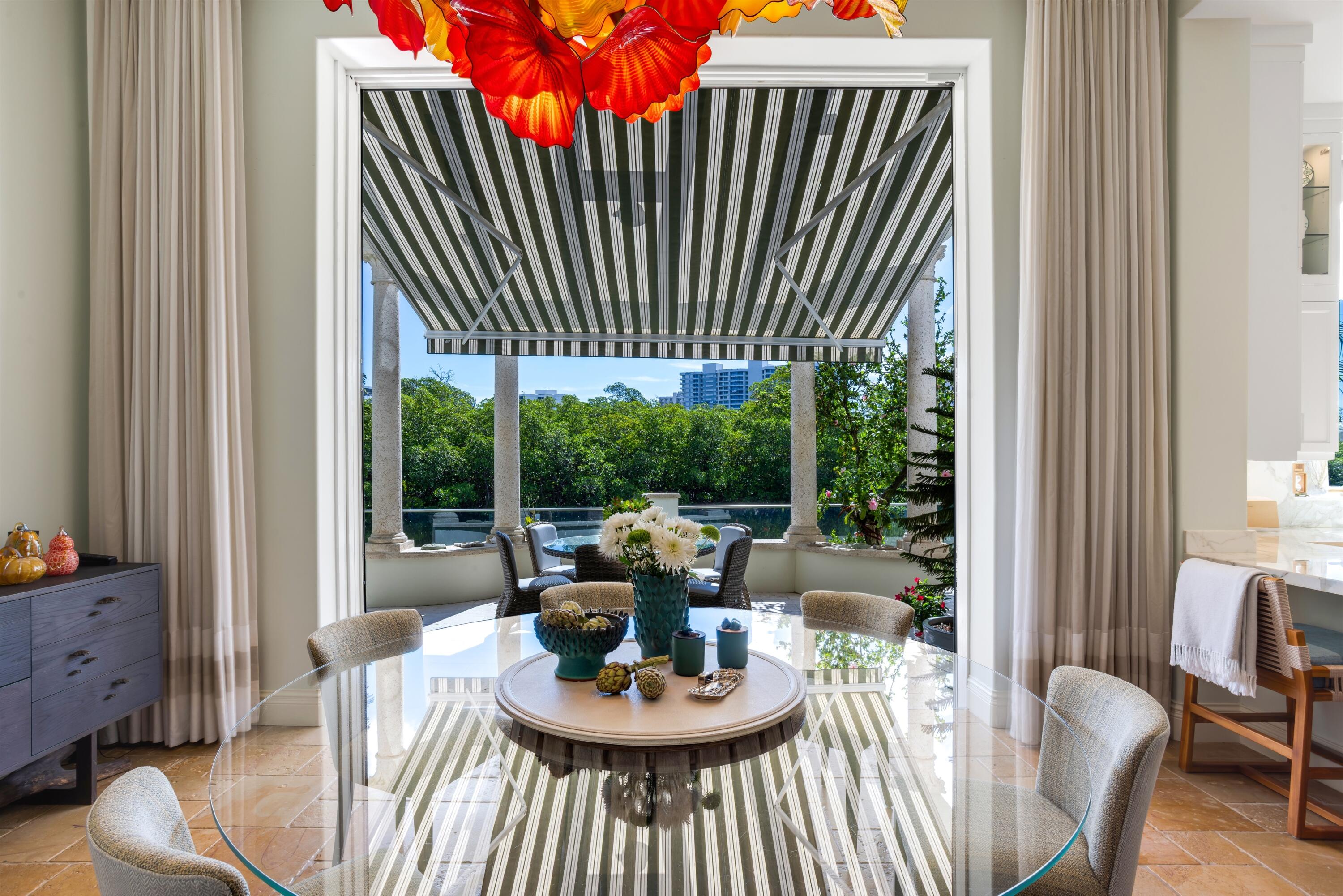 799 Northeast 45th Road Boca Raton, FL 33431 - Photo 26 of 90 a view of a dining room with furniture window and outside view