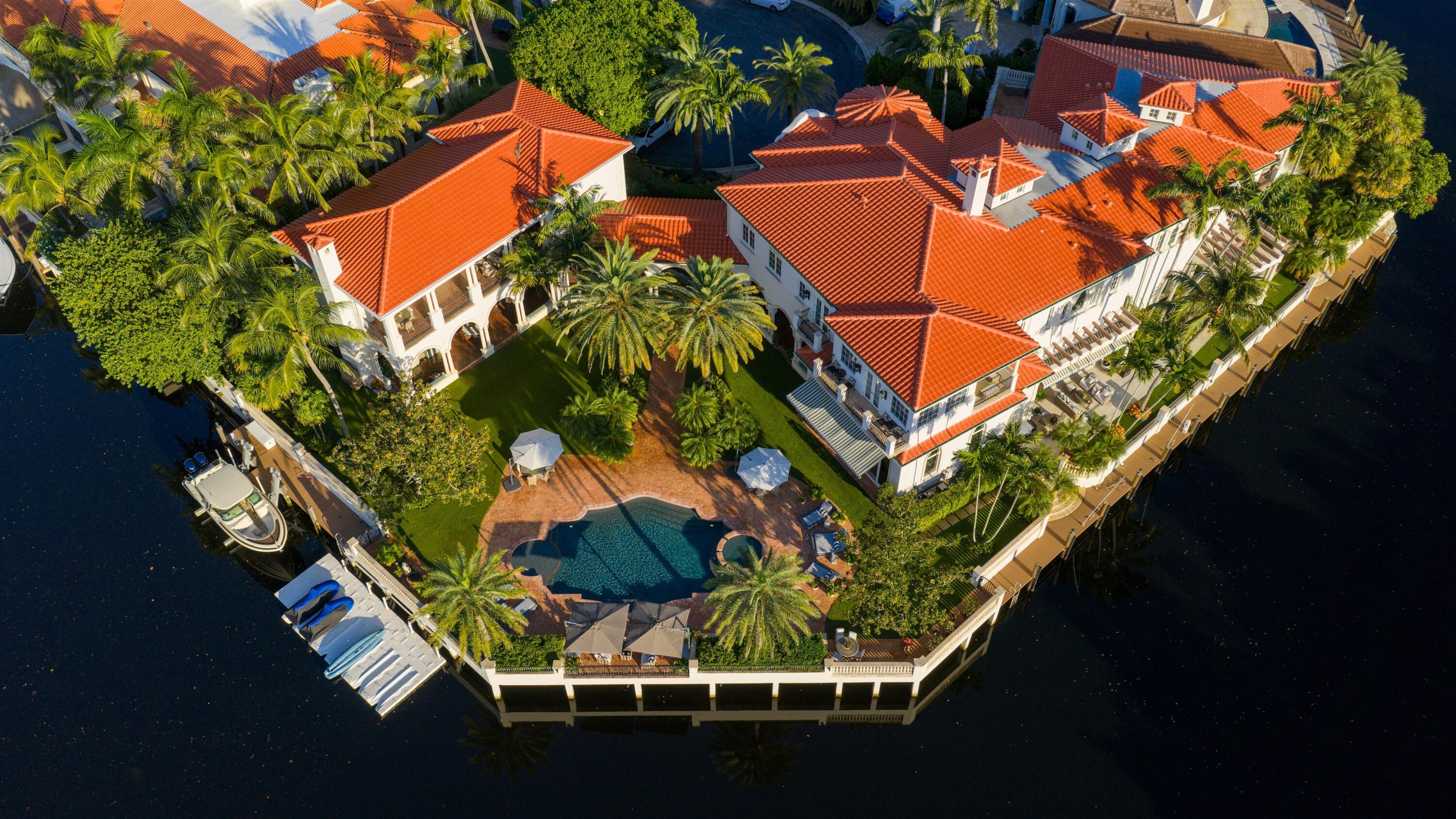 799 Northeast 45th Road Boca Raton, FL 33431 - Photo 3 of 90 an aerial view of a house with a yard and outdoor seating