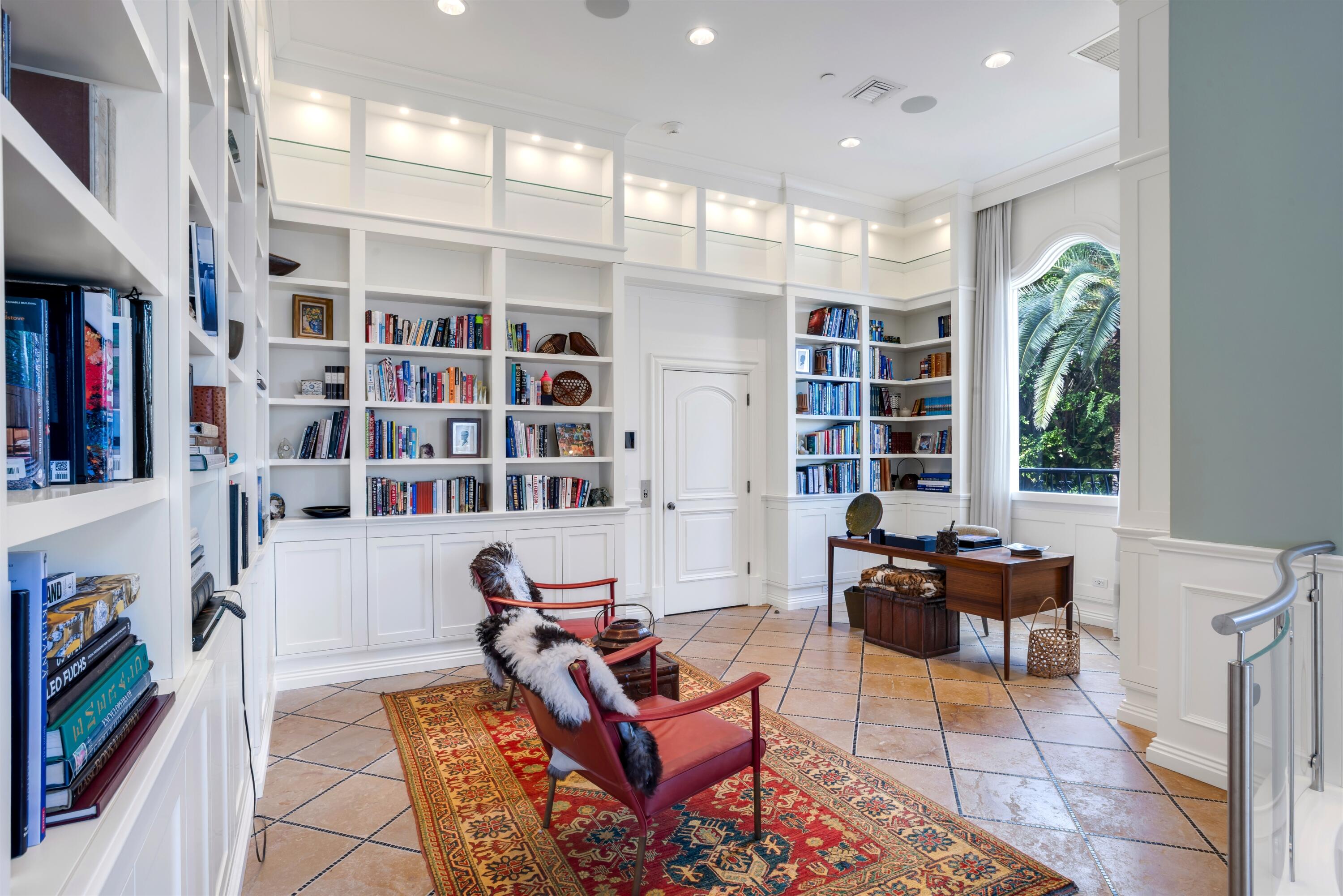 799 Northeast 45th Road Boca Raton, FL 33431 - Photo 36 of 90 a living room with furniture a piano and a bookshelf