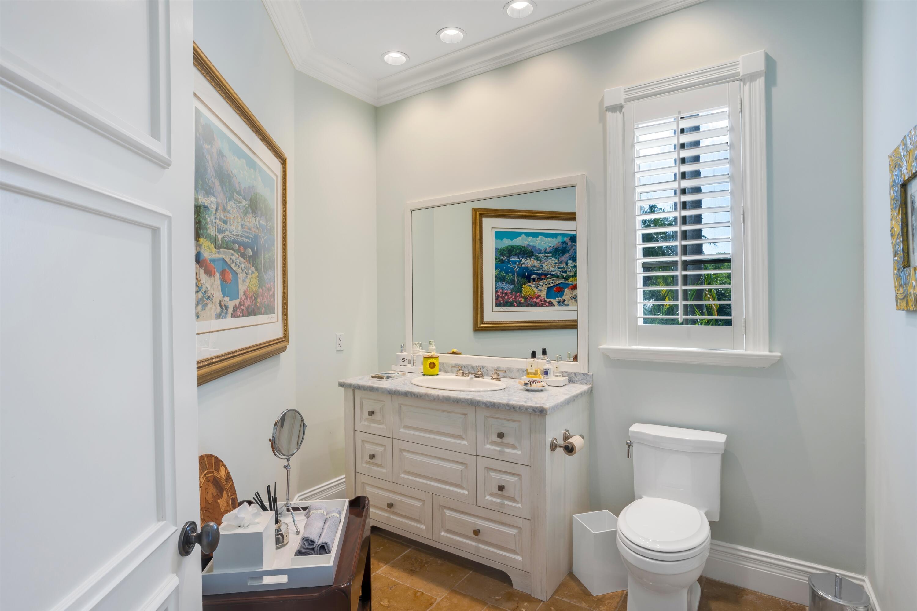799 Northeast 45th Road Boca Raton, FL 33431 - Photo 50 of 90 a bathroom with a toilet a sink and a window