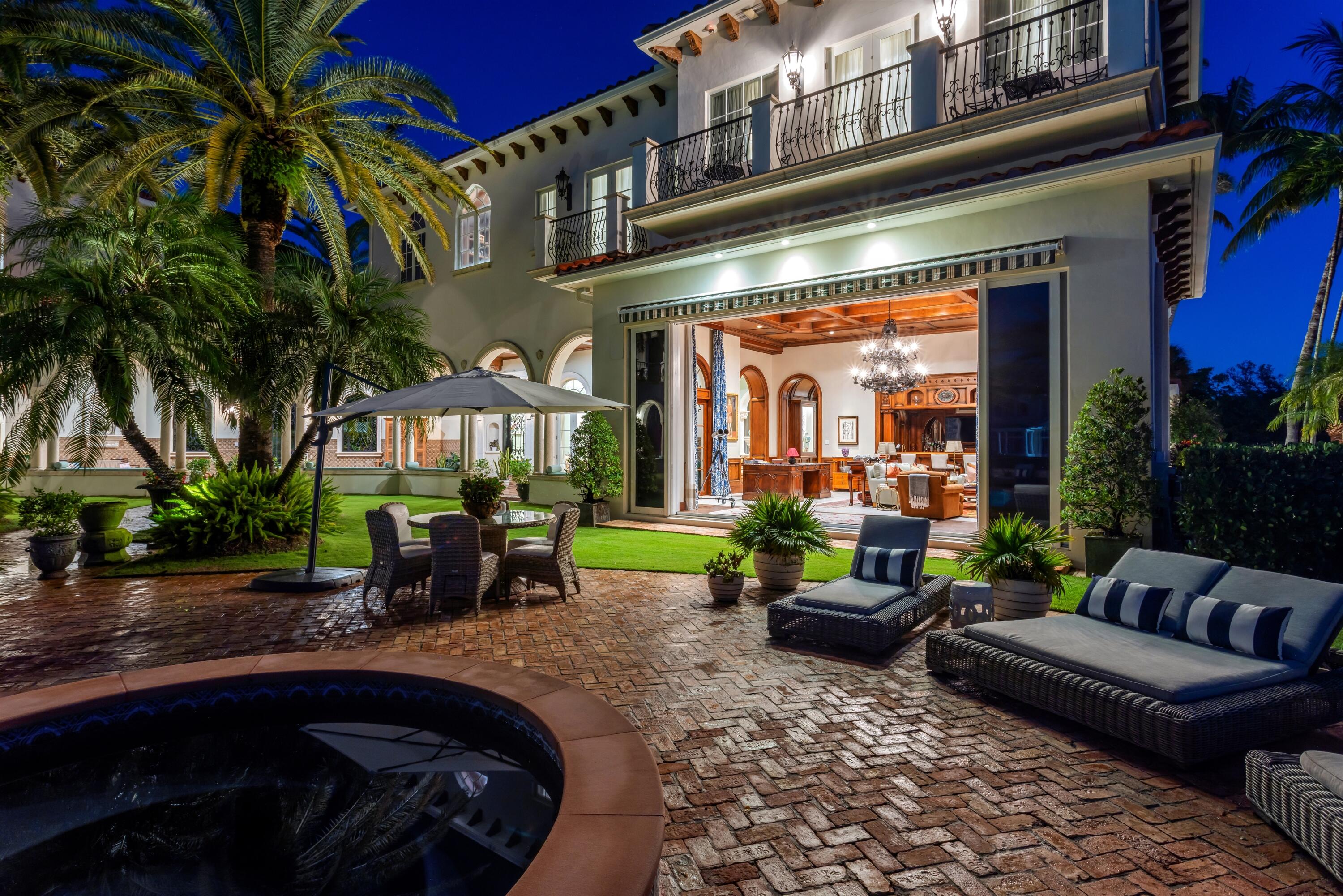 799 Northeast 45th Road Boca Raton, FL 33431 - Photo 87 of 90 a view of a patio with couches and a fire pit