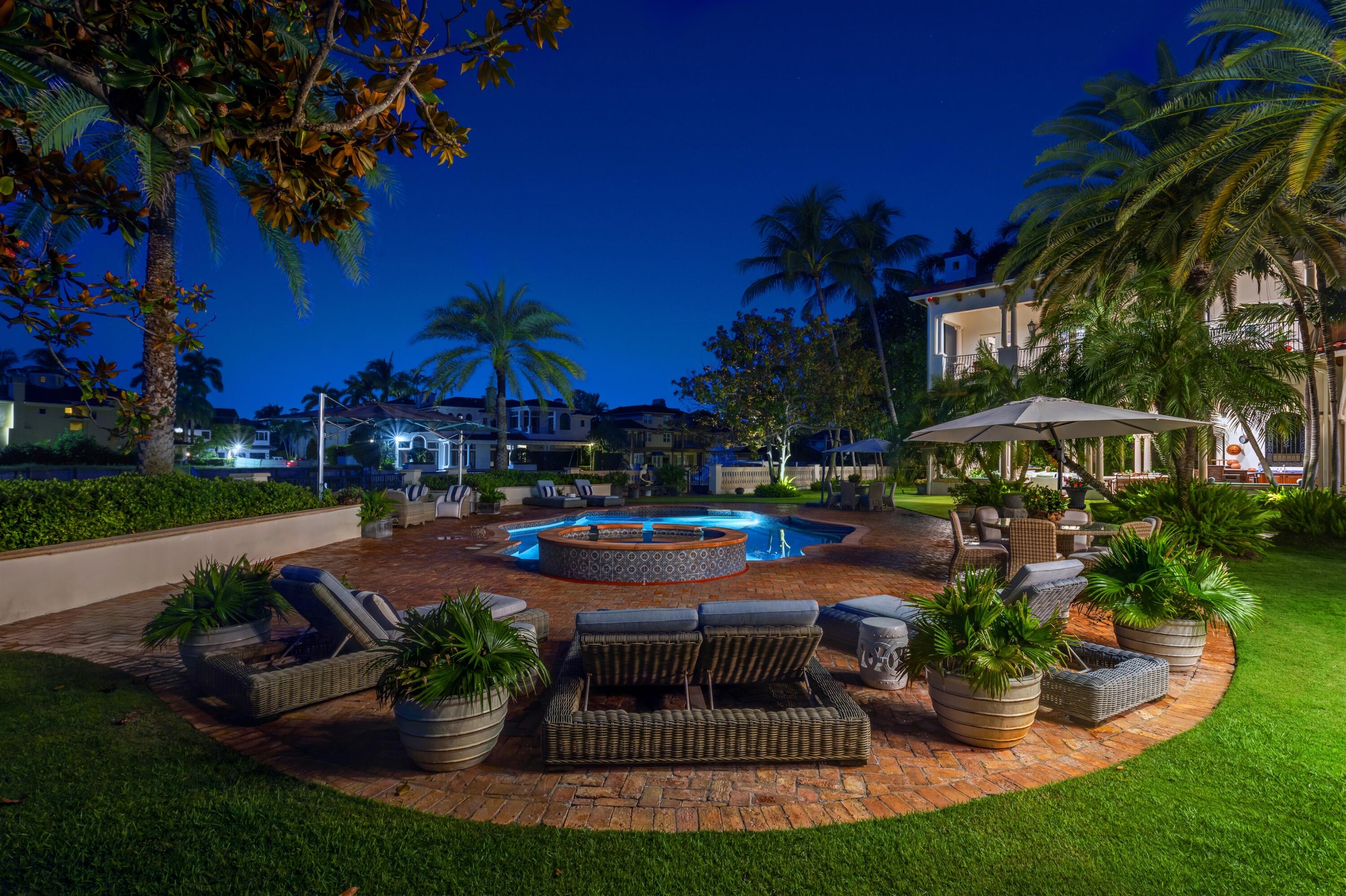 799 Northeast 45th Road Boca Raton, FL 33431 - Photo 89 of 90 a view of a house with garden and sitting area