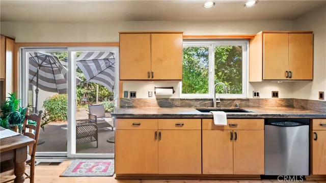 a bed room with a bed and a mirror