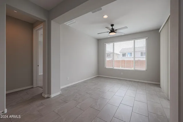 an empty room with fan