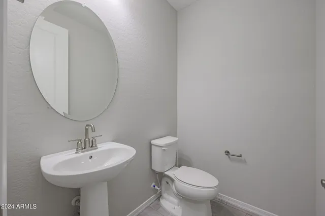 a view of a house with a swimming pool and a yard