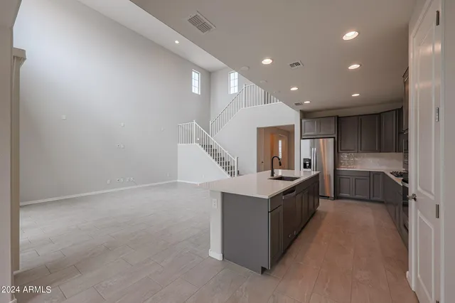 a close view of a stove a microwave and cabinets in the kitchen