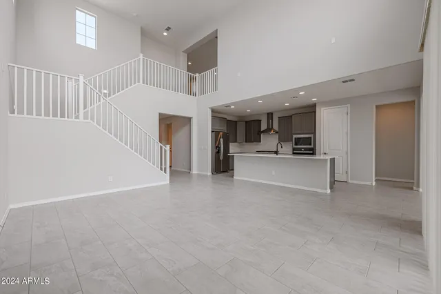 a view of an entryway with wooden floor and windows
