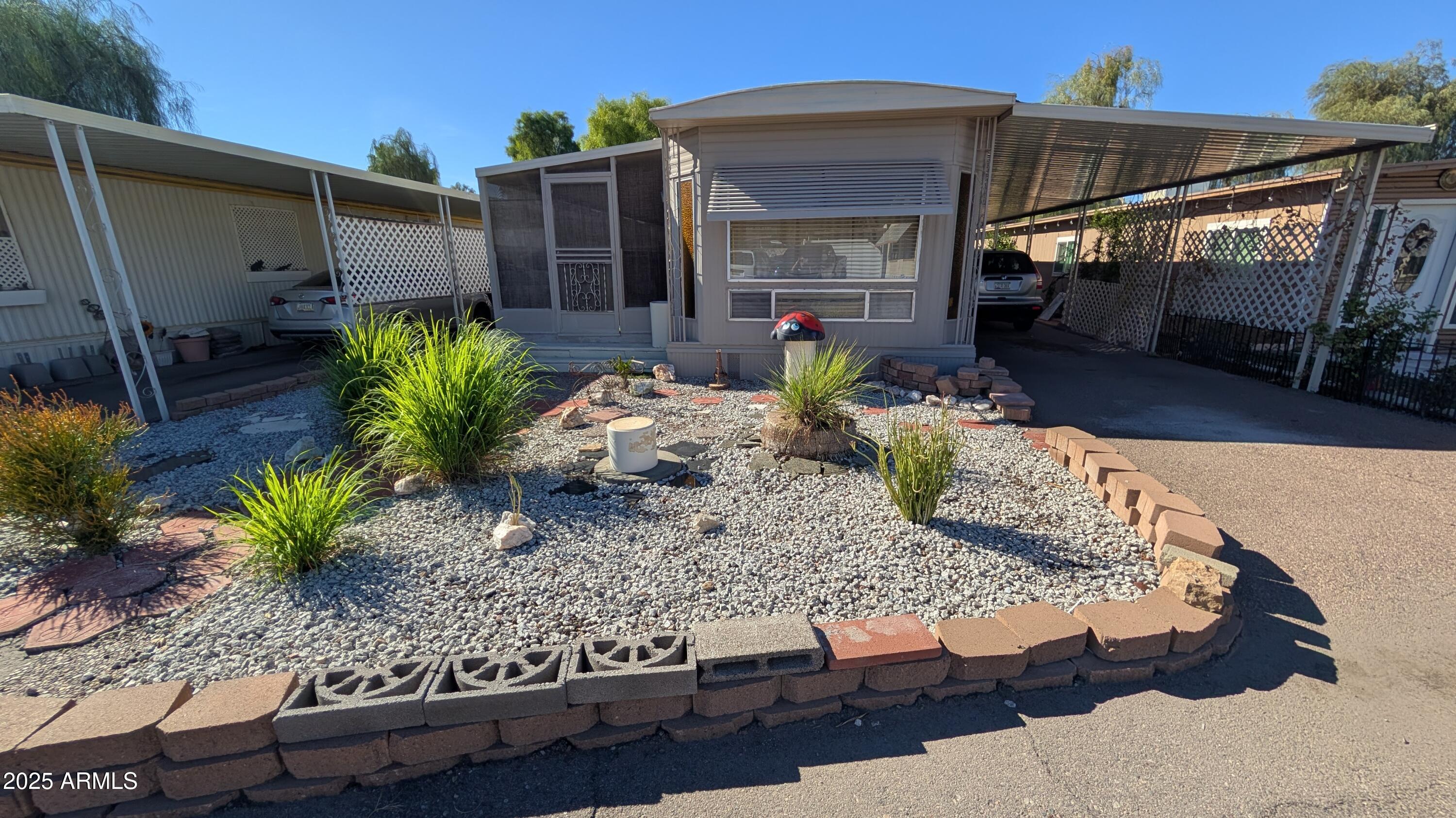 1250 East Bell Road, Unit 23 Phoenix, AZ 85022 - Photo 21 of 26 a view of a house with patio