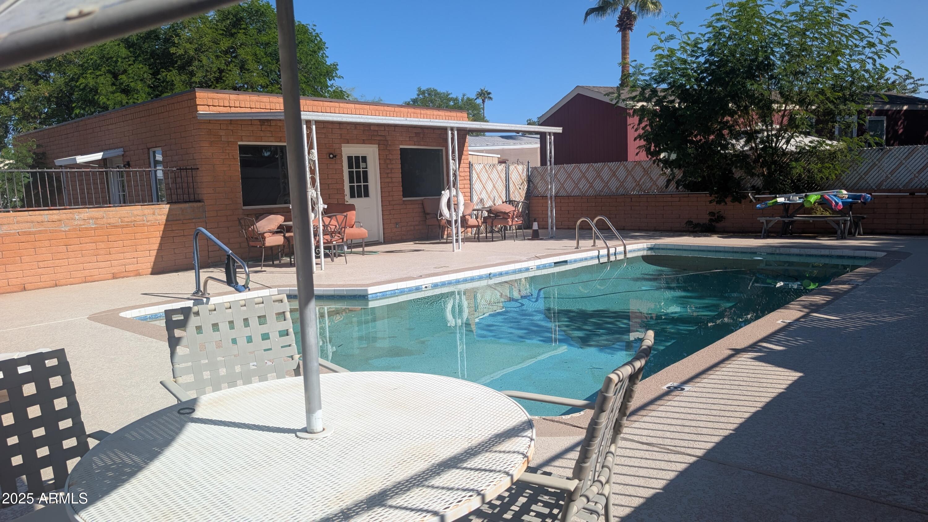 1250 East Bell Road, Unit 23 Phoenix, AZ 85022 - Photo 25 of 26 a house view with a sitting space