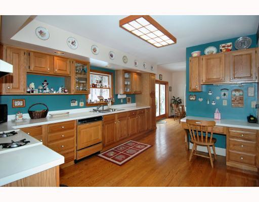 102 Oakhurst Road Pittsburgh, PA 15215 - Photo 3 of 16 Kitchen. This well designed kitchen offers an incredible amount of counter and cabinet space. The desk area offers additional work space. Kitchen opens to the breakfast area seen in the back ground.