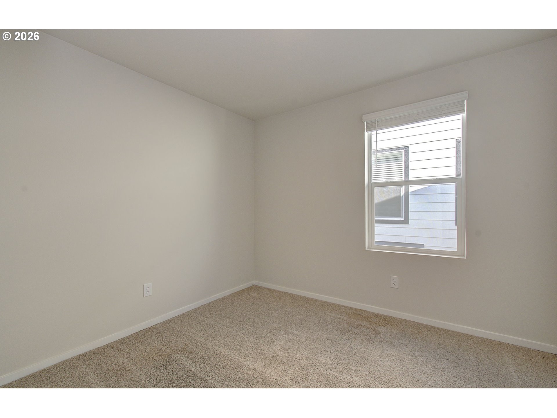 17402 Northwest 10th Place Ridgefield, WA 98642 - Photo 22 of 36 a view of an empty room with a window