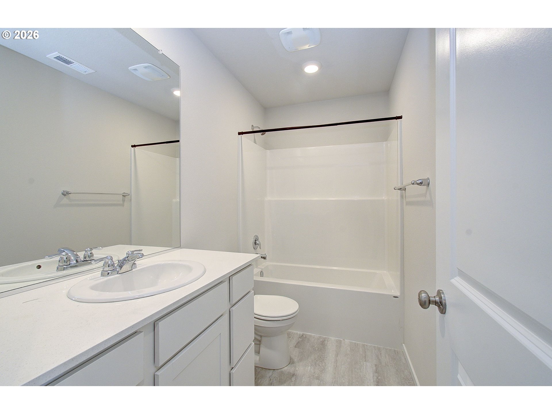 17402 Northwest 10th Place Ridgefield, WA 98642 - Photo 24 of 36 a bathroom with a sink a toilet and shower