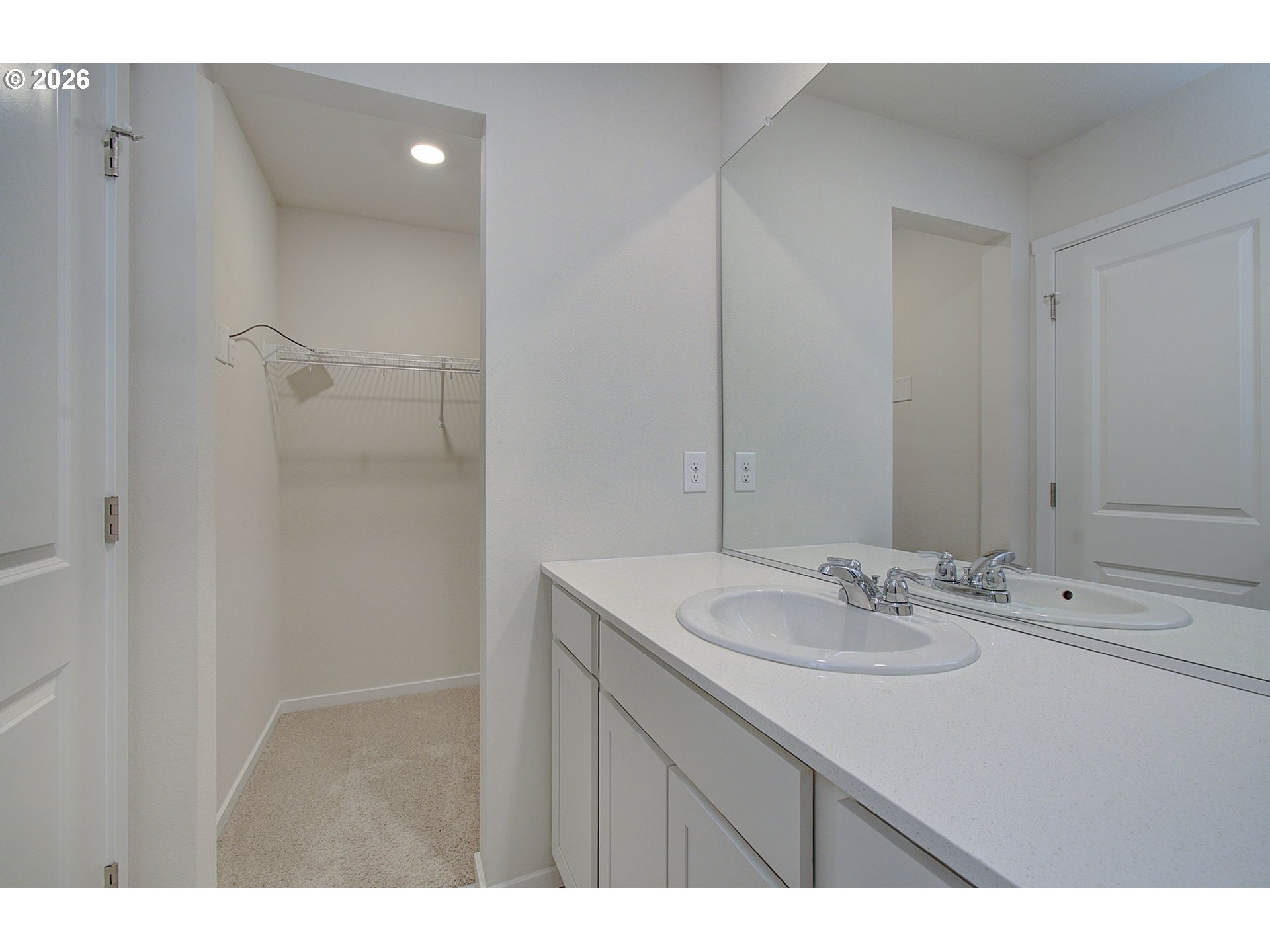 17402 Northwest 10th Place Ridgefield, WA 98642 - Photo 27 of 36 a bathroom with a sink and a mirror