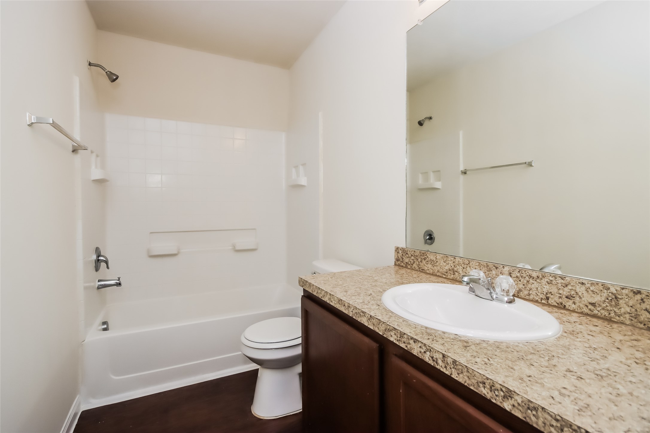 2418 High Island Way, Unit A Houston, TX 77073 - Photo 14 of 14 a bathroom with a granite countertop sink toilet and shower
