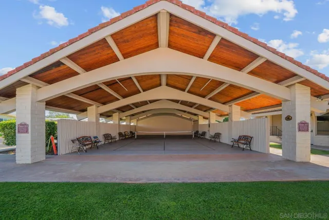 a view of a road with a building in the background