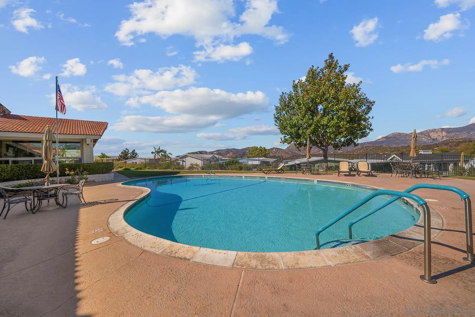 9500 Harritt Road, Unit 198 Lakeside, CA 92040 - Photo 12 of 48 a view of a swimming pool with a patio