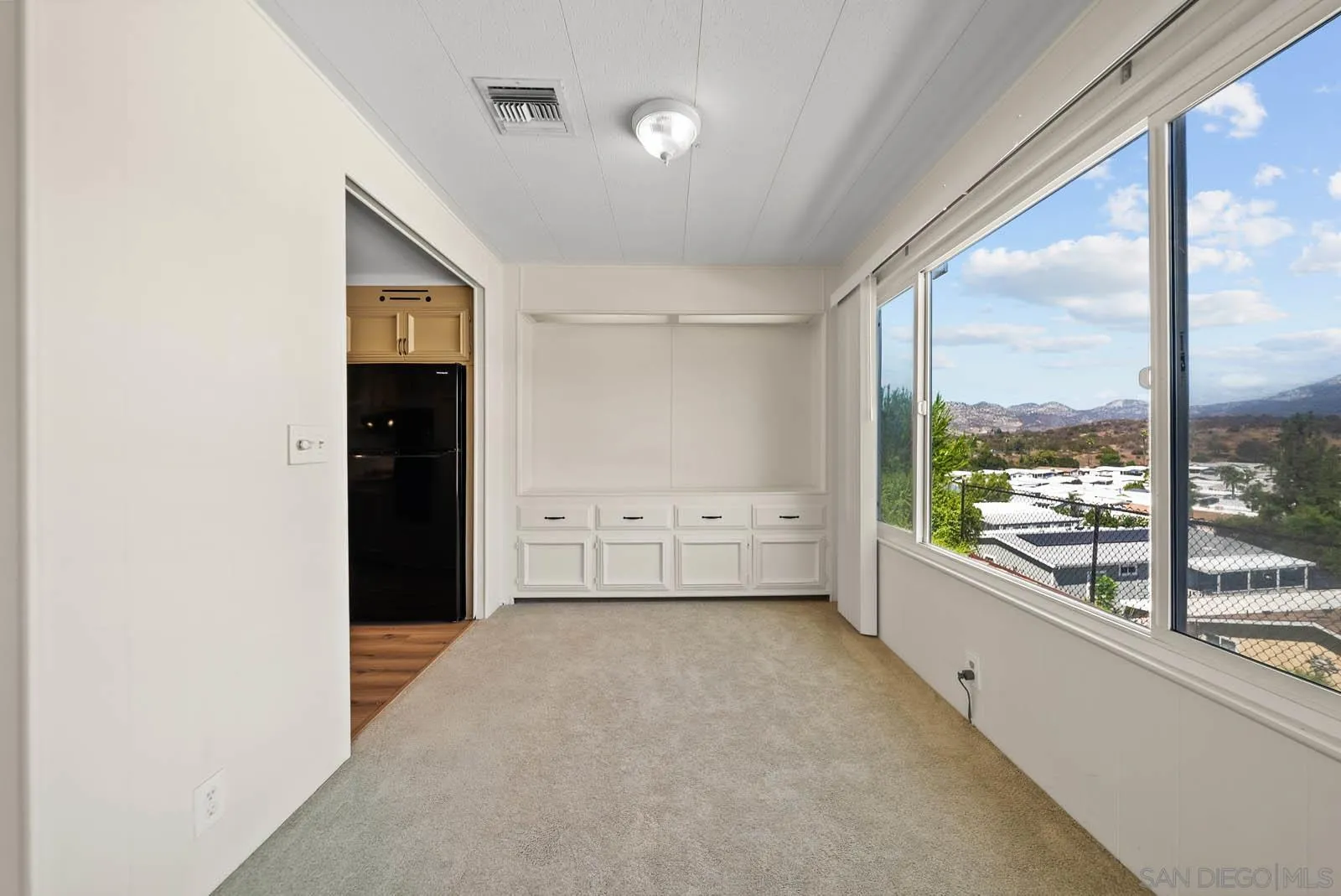 9500 Harritt Road, Unit 198 Lakeside, CA 92040 - Photo 18 of 48 a view of an empty room and window