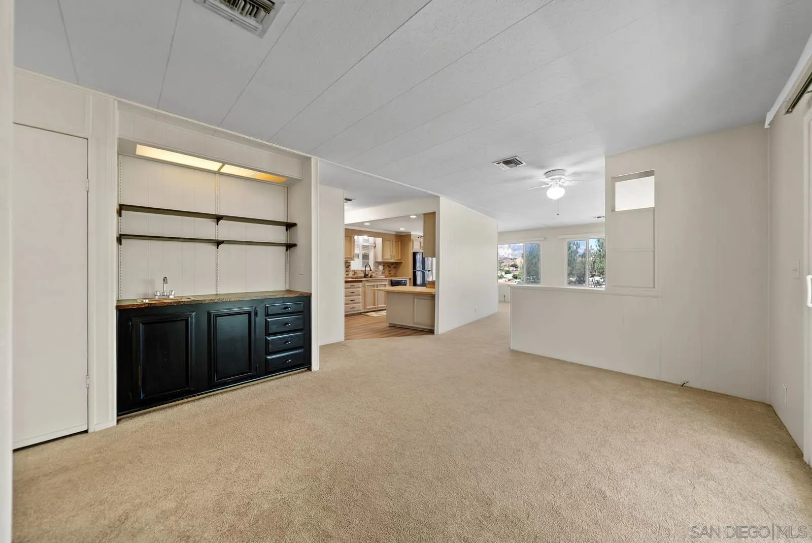 9500 Harritt Road, Unit 198 Lakeside, CA 92040 - Photo 27 of 48 an empty room with furniture and window