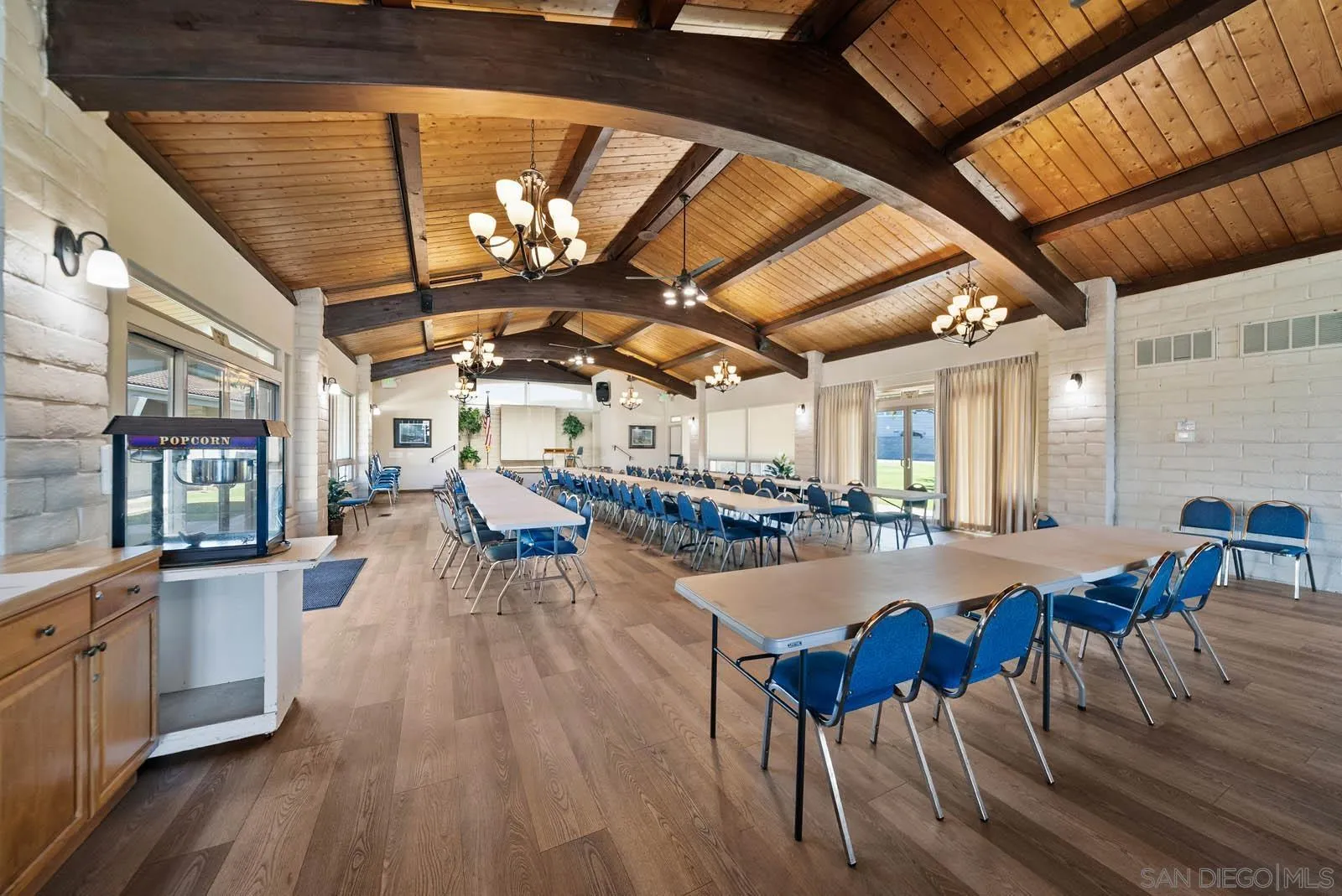 9500 Harritt Road, Unit 198 Lakeside, CA 92040 - Photo 38 of 48 a outdoor space with lots of chairs and wooden floor
