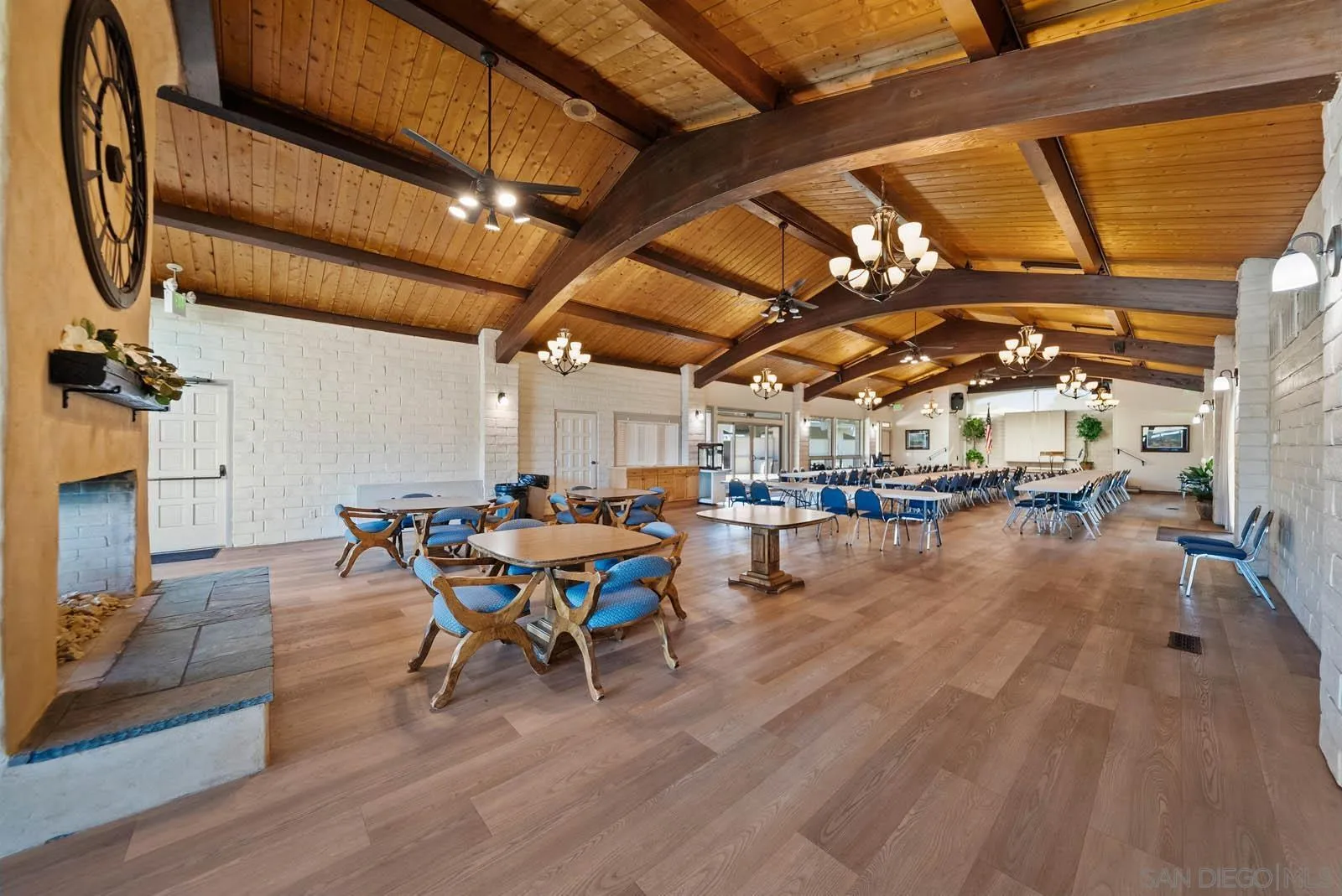 9500 Harritt Road, Unit 198 Lakeside, CA 92040 - Photo 41 of 48 a dining room with a wooden table and chairs