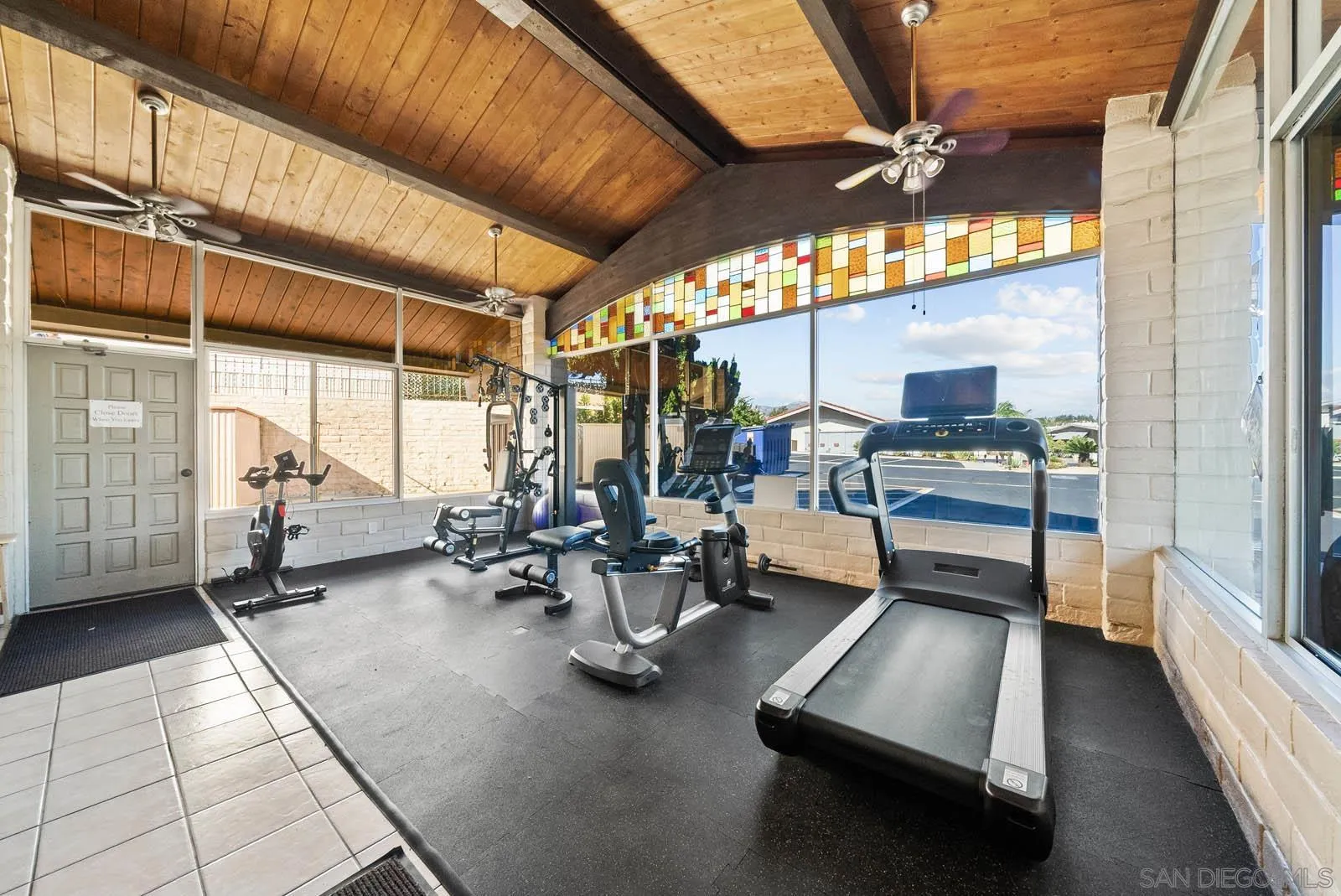 9500 Harritt Road, Unit 198 Lakeside, CA 92040 - Photo 45 of 48 a room with gym equipment and large mirror