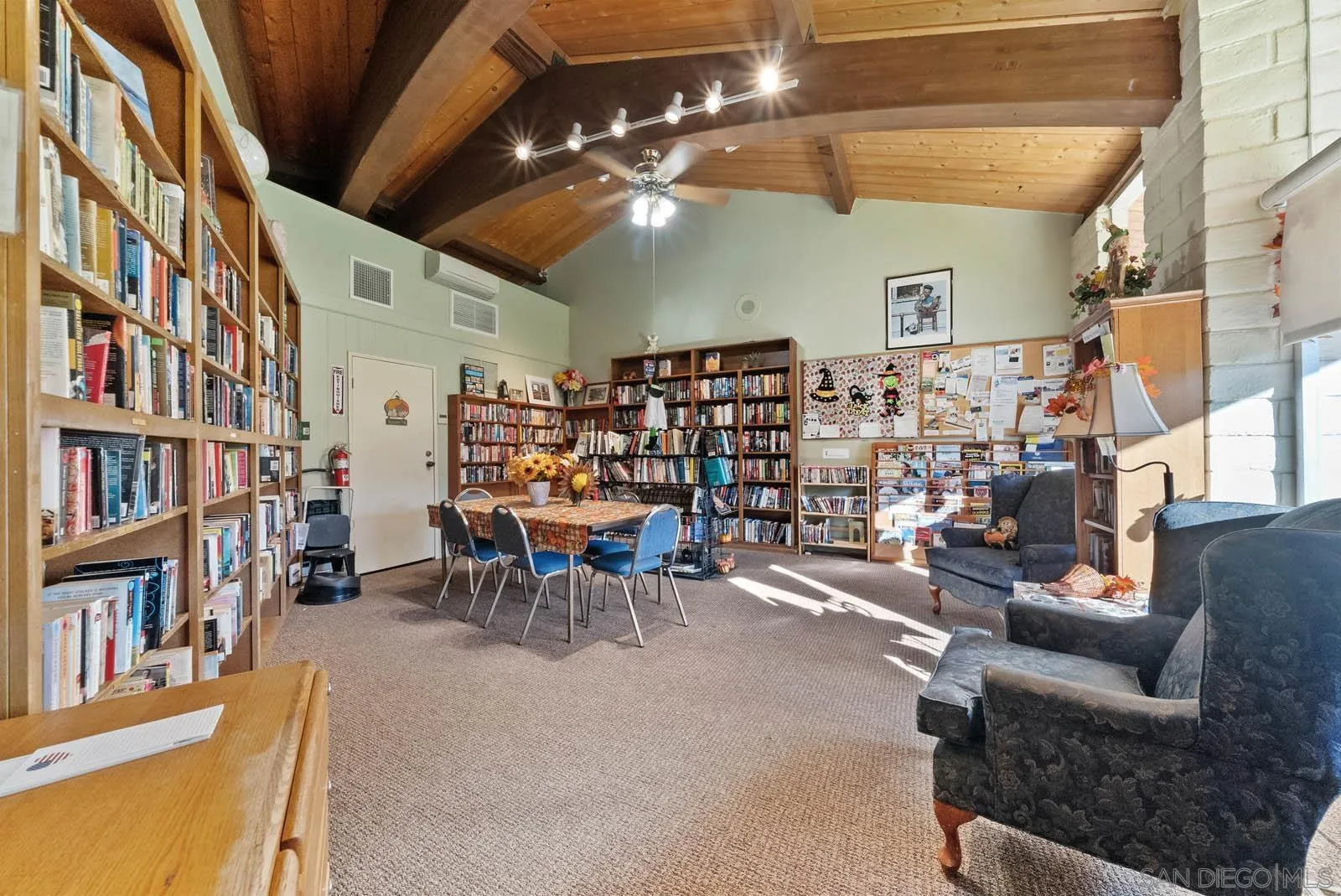 9500 Harritt Road, Unit 198 Lakeside, CA 92040 - Photo 46 of 48 a view of a livingroom with furniture and a bookshelf