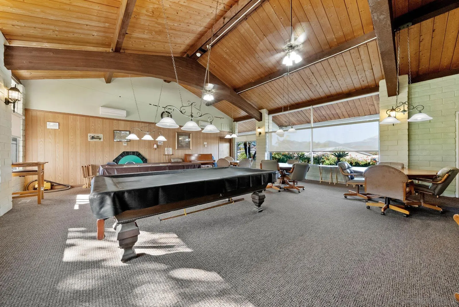 9500 Harritt Road, Unit 198 Lakeside, CA 92040 - Photo 47 of 48 a room with gym equipment and a table