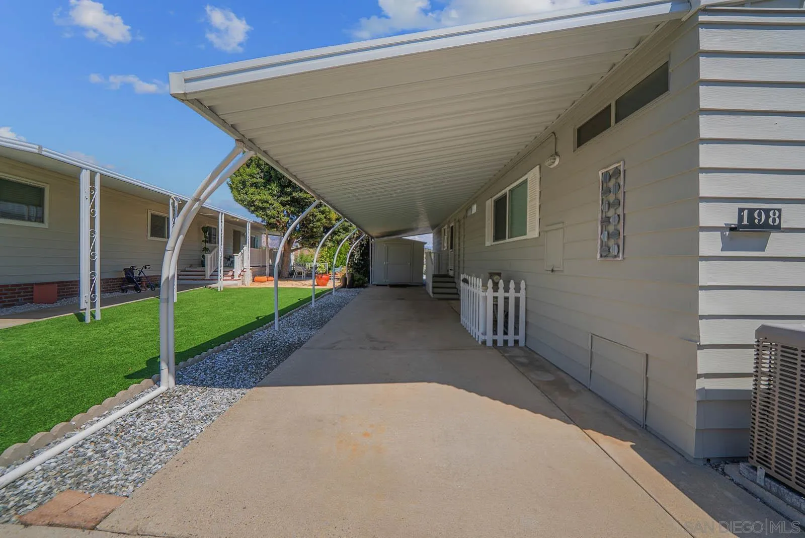 9500 Harritt Road, Unit 198 Lakeside, CA 92040 - Photo 6 of 48 a view of a house with a backyard