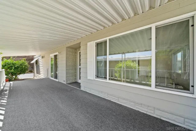 a view of a swimming pool with a patio