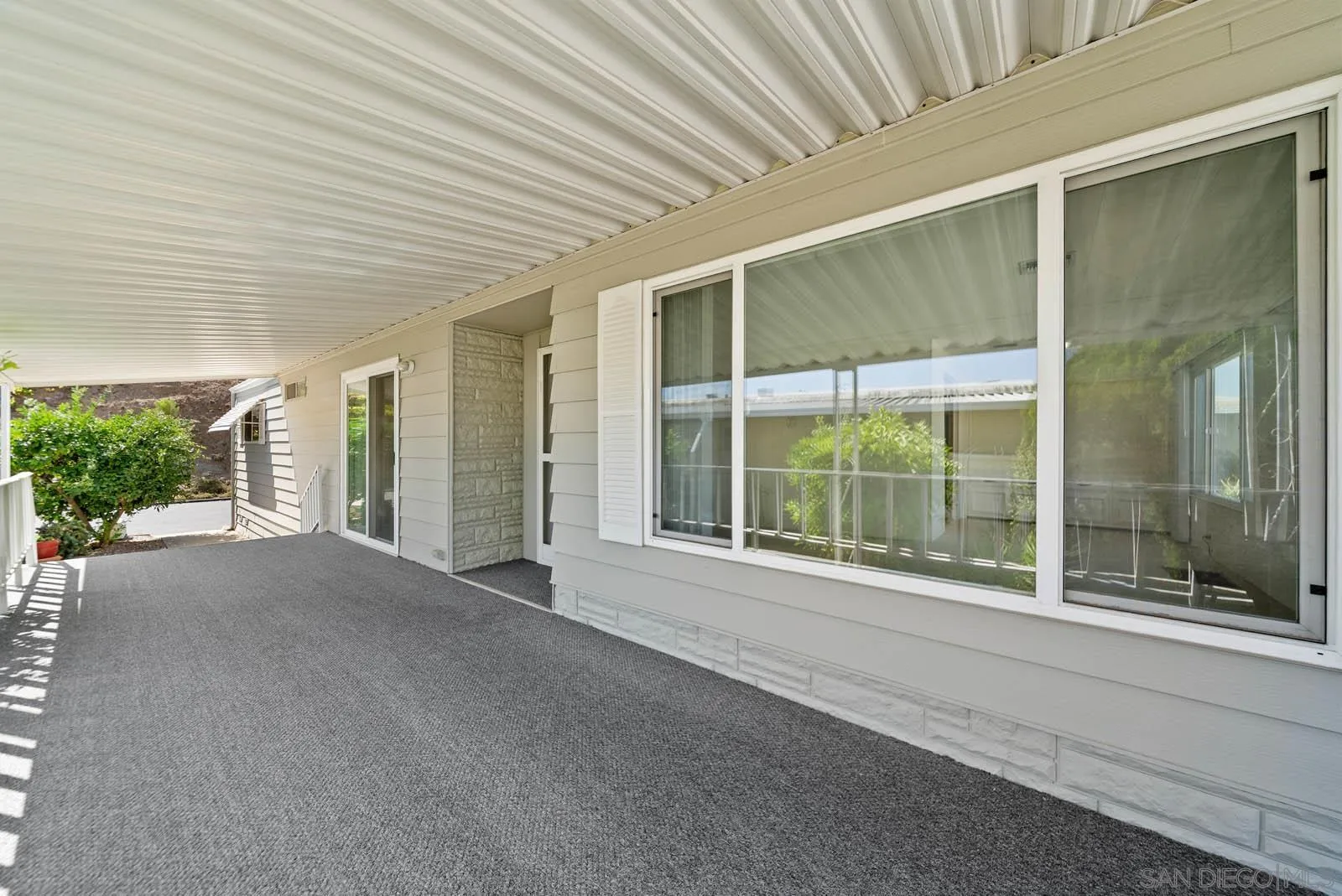 9500 Harritt Road, Unit 198 Lakeside, CA 92040 - Photo 9 of 48 a view of a house with a porch
