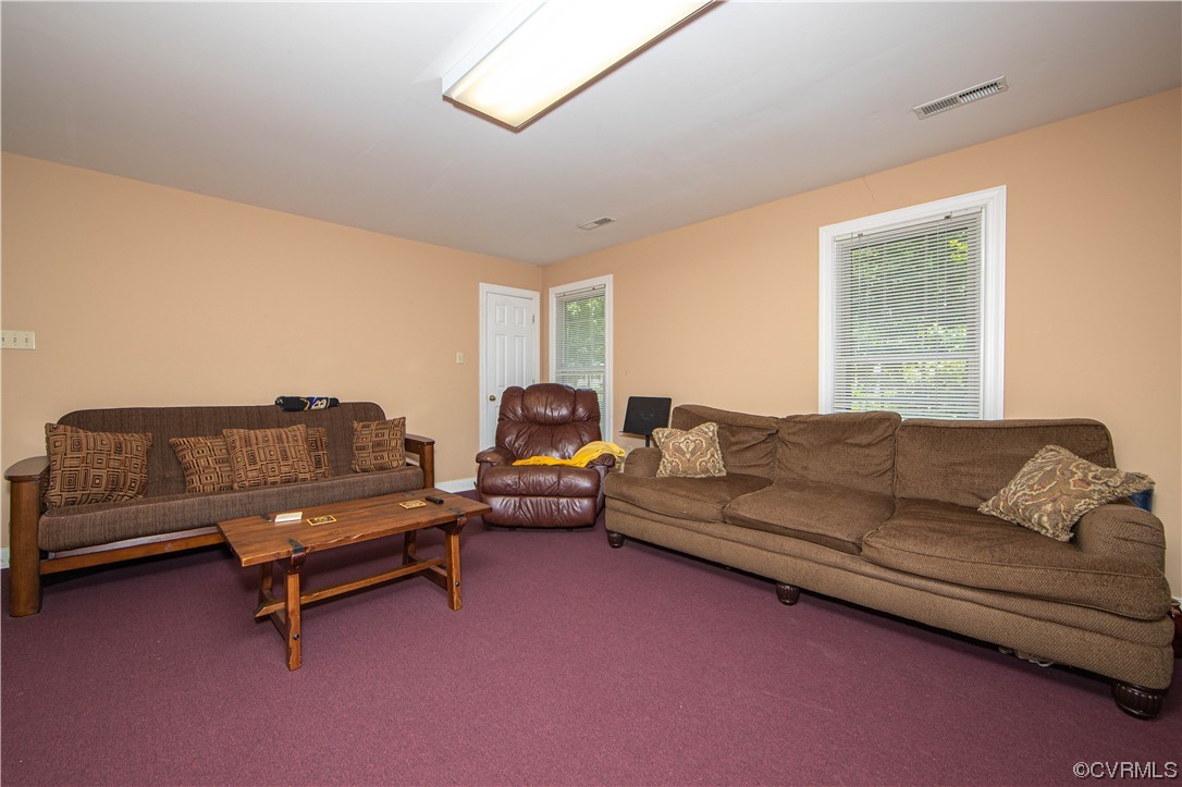 2620 Salisbury Road Midlothian, VA 23113 - Photo 16 of 36 a living room with furniture and a couch