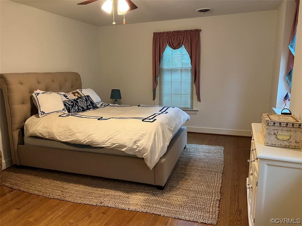 2620 Salisbury Road Midlothian, VA 23113 - Photo 20 of 36 a bedroom with a bed and a chandelier