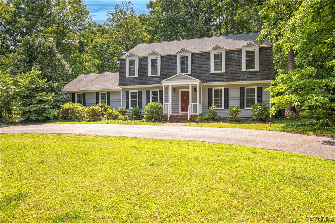 2620 Salisbury Road Midlothian, VA 23113 - Photo 2 of 36 a front view of house with yard and green space
