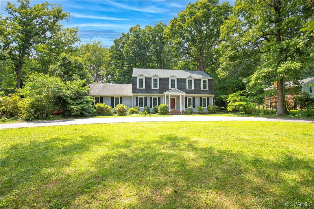 2620 Salisbury Road Midlothian, VA 23113 - Photo 3 of 36 a front view of a house with swimming pool